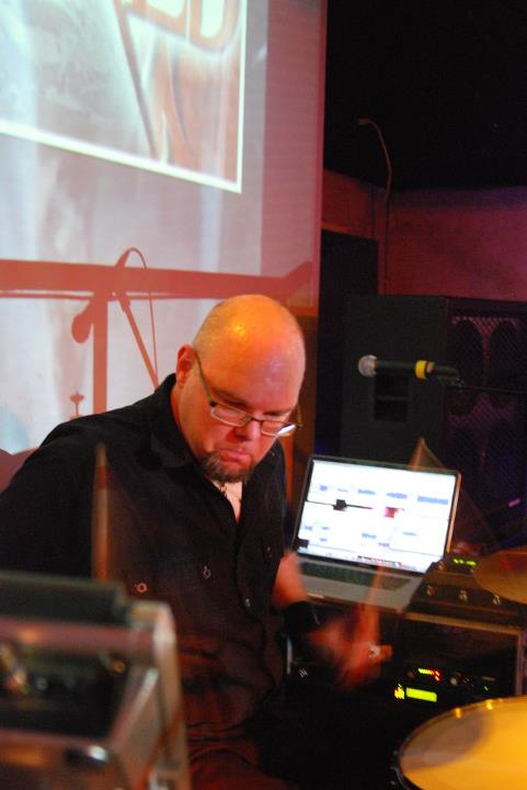 Pete Weaver holding a camera